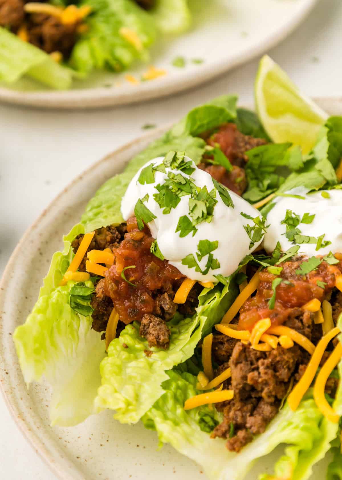 taco lettuce wraps garnished and served
