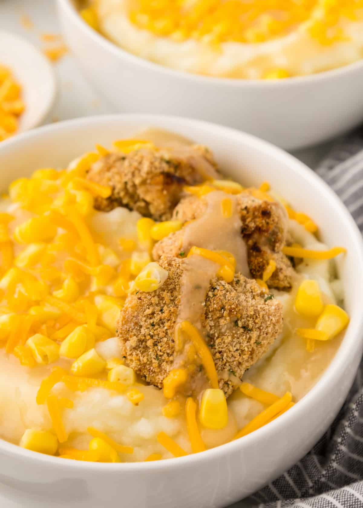 Homemade KFC famous bowl topped with gravy.
