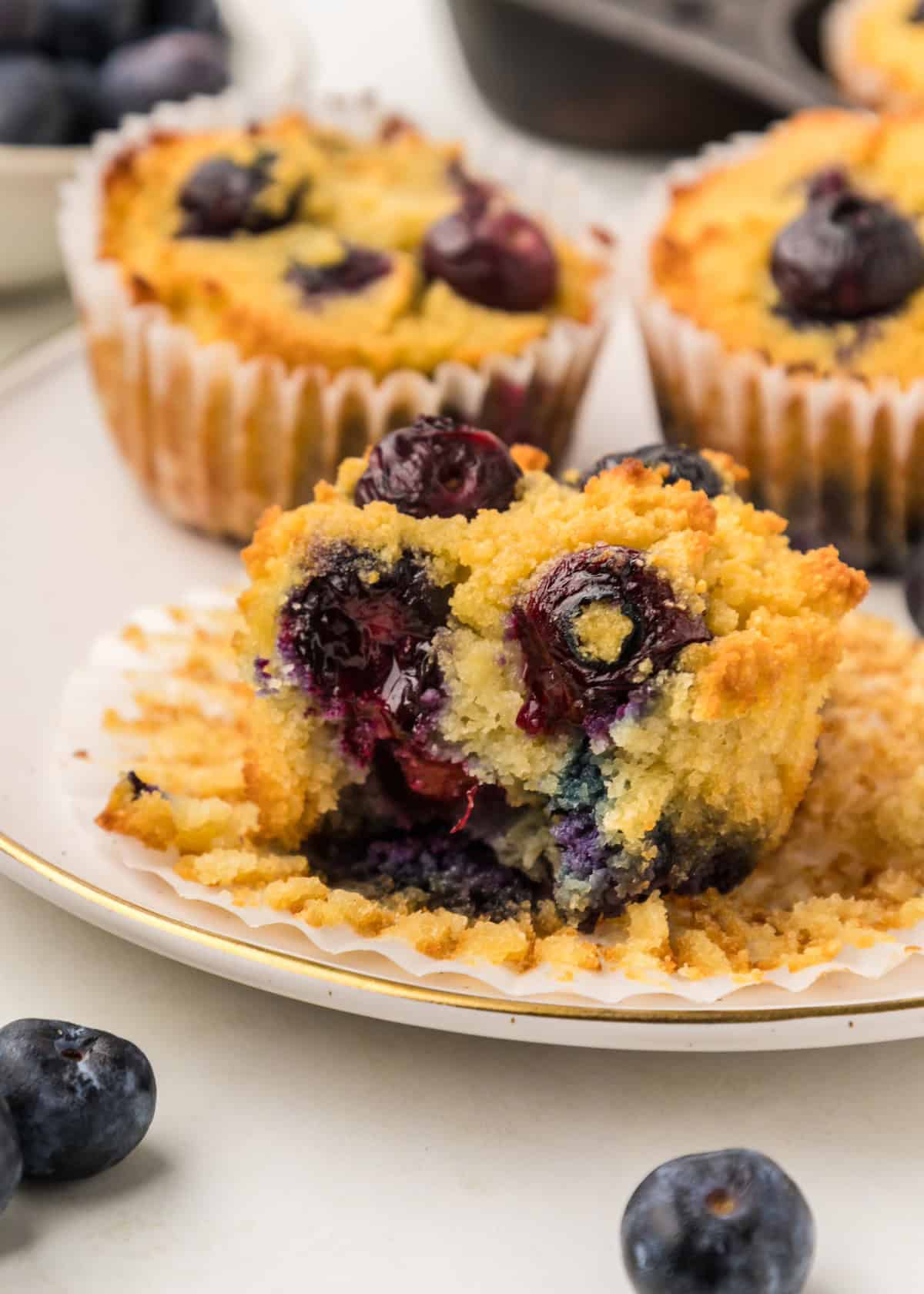 paleo blueberry muffin with its wrapper taken off