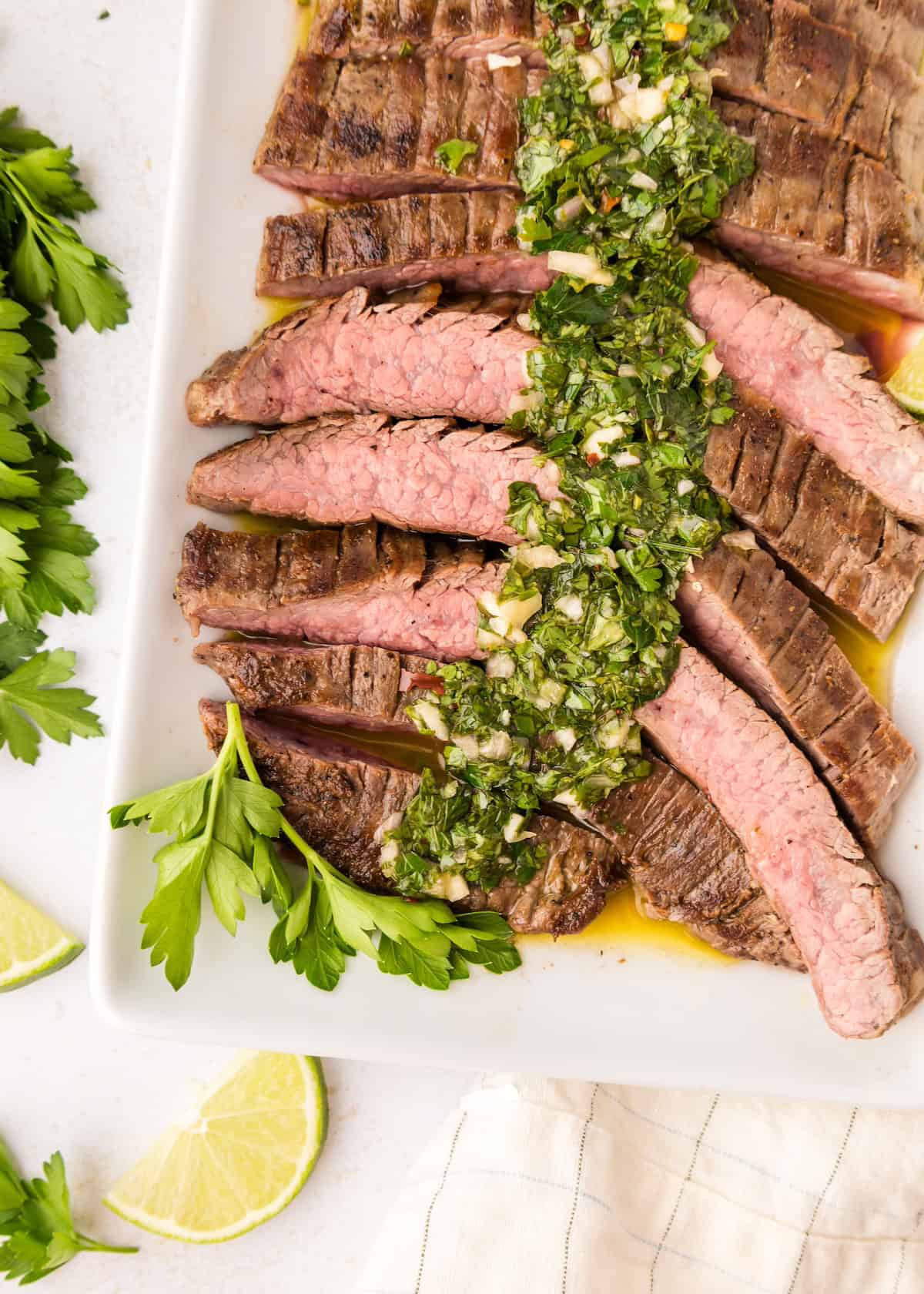 Steak topped with chimichurri sauce.