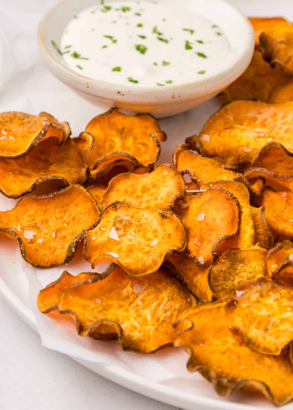 Sweet Potato Chips served with ranch and sprinkled with coarse salt.