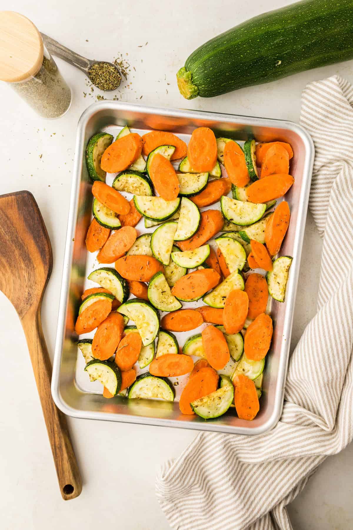 roasted carrots and zucchini on baking sheet