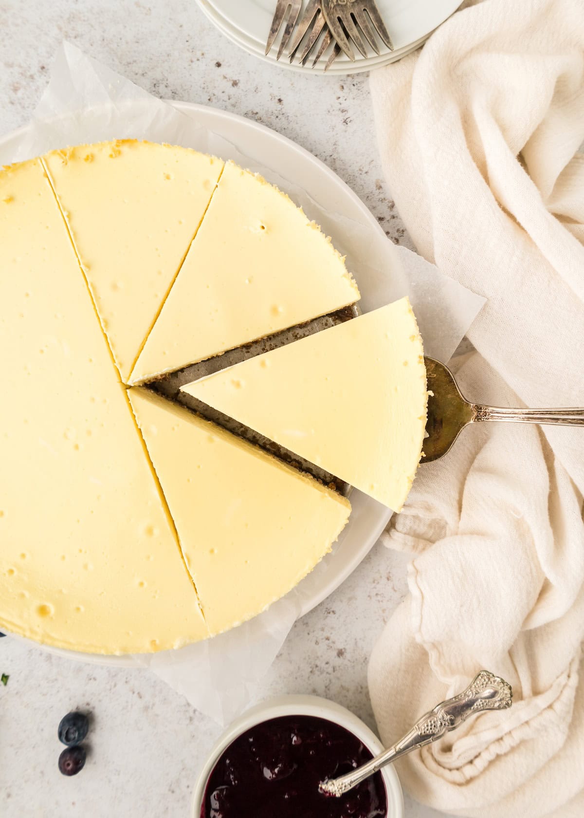 Slice of Healthy Cheesecake being removed.