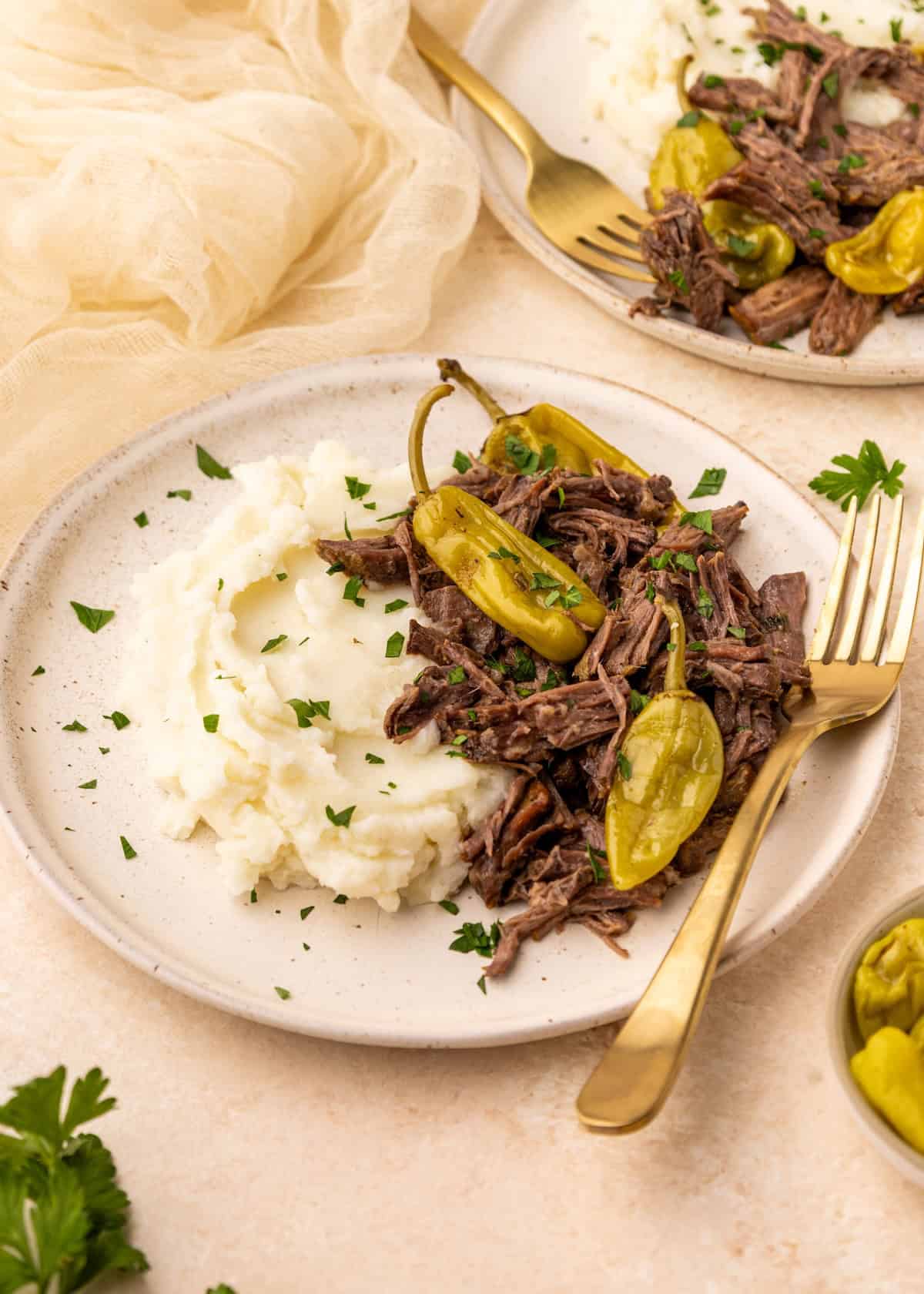 Mississippi Pot Roast with pepperoncini and mashed potatoes.